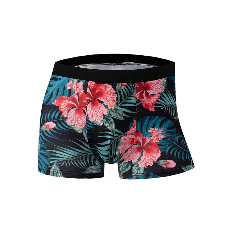 Men's printed ice silk underwear in floral, brown, and seaside designs showing mid waist fit.