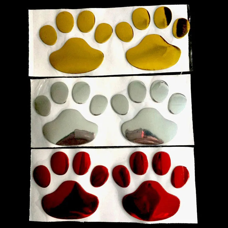 PVC car stickers showing hand-shaped brush design with dog footprints pattern in four colour options