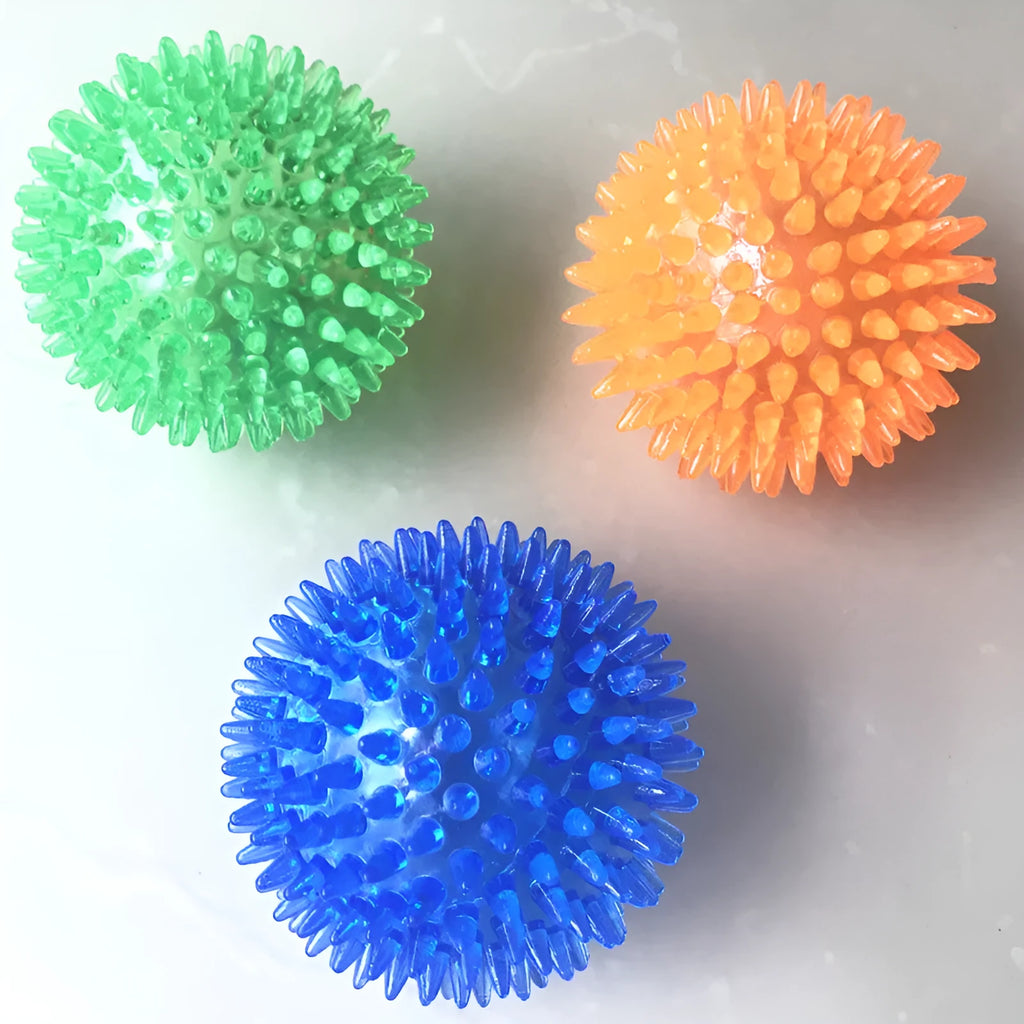 Large dog vocal toy ball in green TPR material with squeaker, 11cm diameter, on a white background
