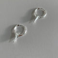 Geometric star-shaped copper ear clip with white gold electroplated finish