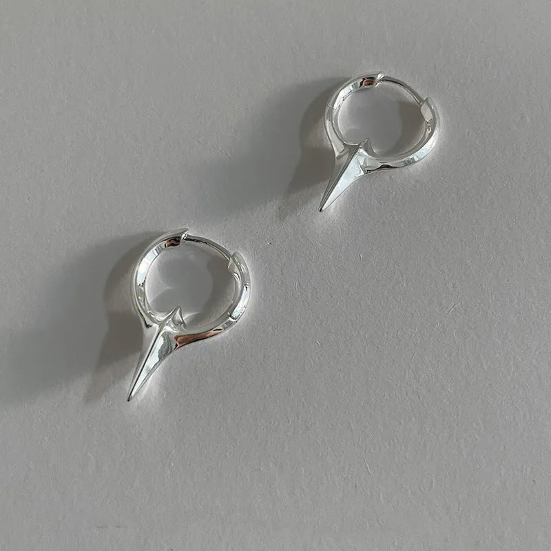 Geometric star-shaped copper ear clip with white gold electroplated finish