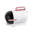 White pet grooming vacuum cleaner with attached shaver, hose, and set of grooming combs and calipers.