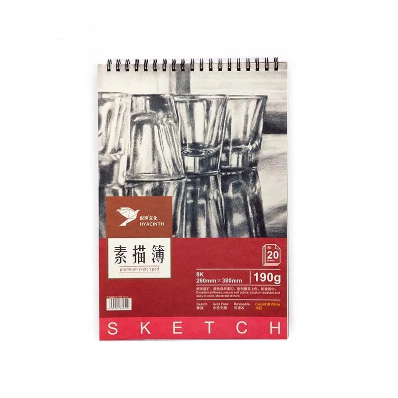 A4 size coil bound sketchbook open flat on a table, showing blank 160g paper.