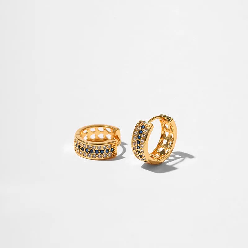 Round geometric women's earrings with 18K gold electroplated finish on copper base metal