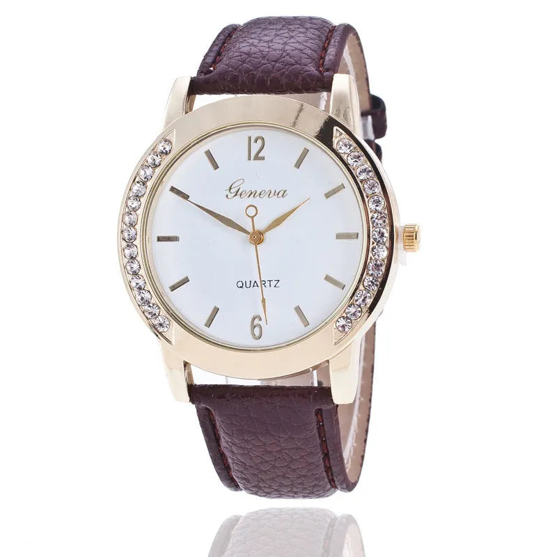 Geneva women's quartz watch with blue dial, round alloy case, and imitation leather strap on display