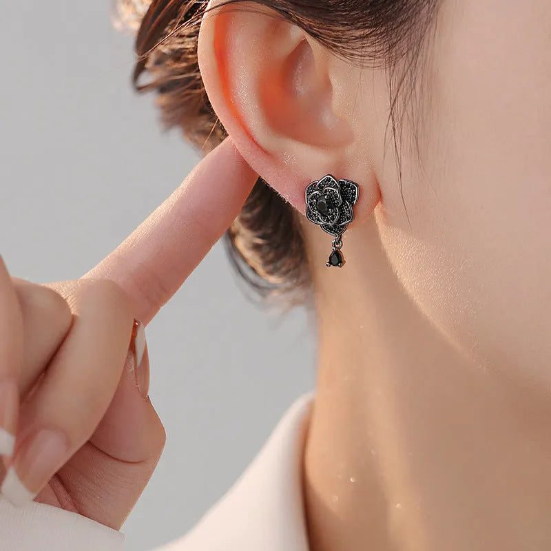 Black rose stud earrings with floral zircon design and gold-coloured electroplating