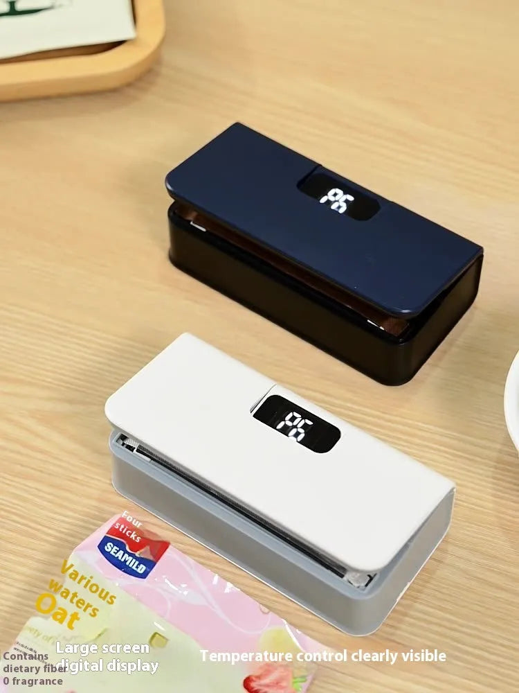 Small portable mini sealing machine for heat sealing plastic bags in blue or white colour