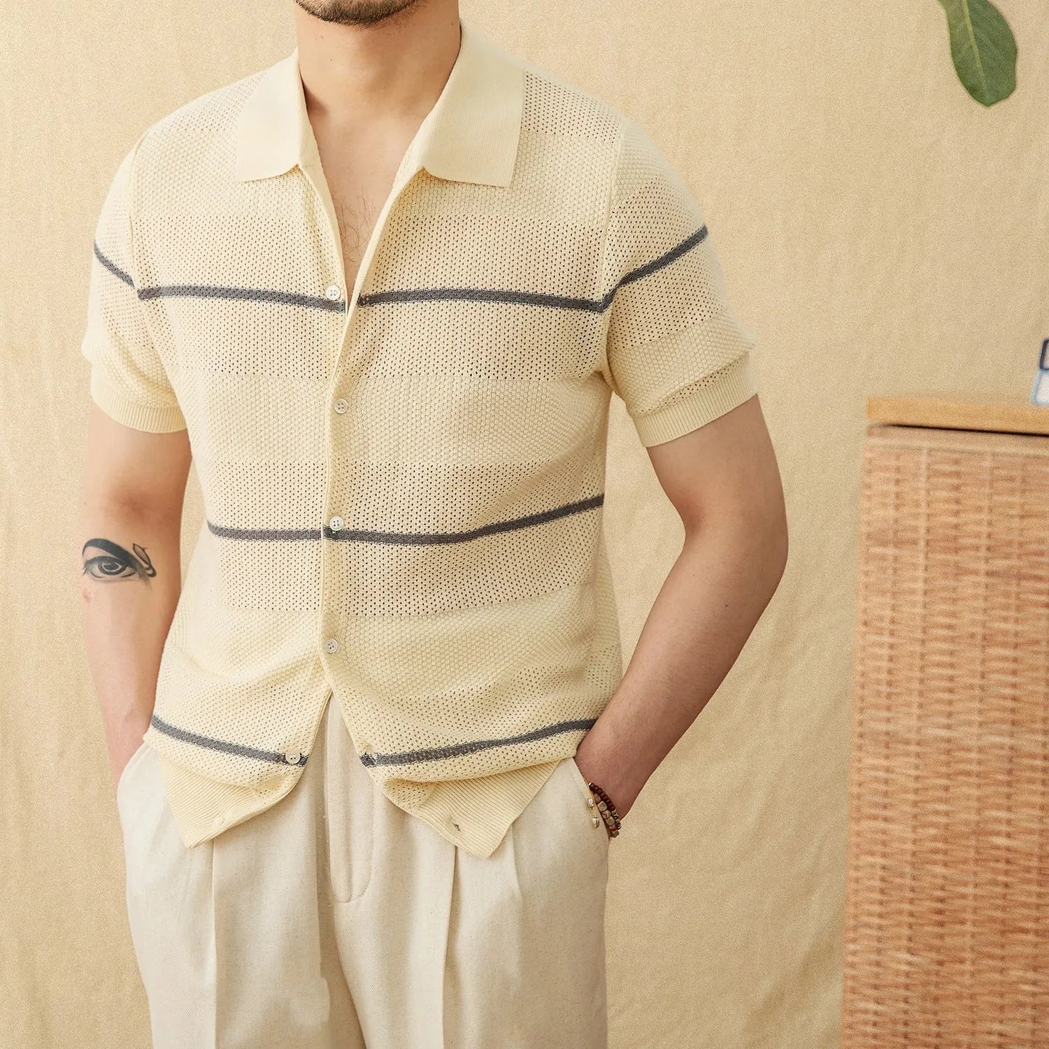 Men's camel coloured lapel cardigan with short sleeves, made from a cotton linen knitted fabric.