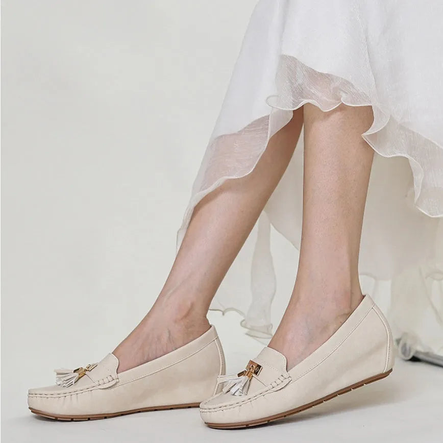 Mid-heel casual shoe with round toe and artificial PU upper in a nude colour.