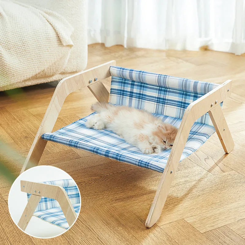 Wooden frame cat hammock bed with blue cloth in beach chair design for indoor cats.