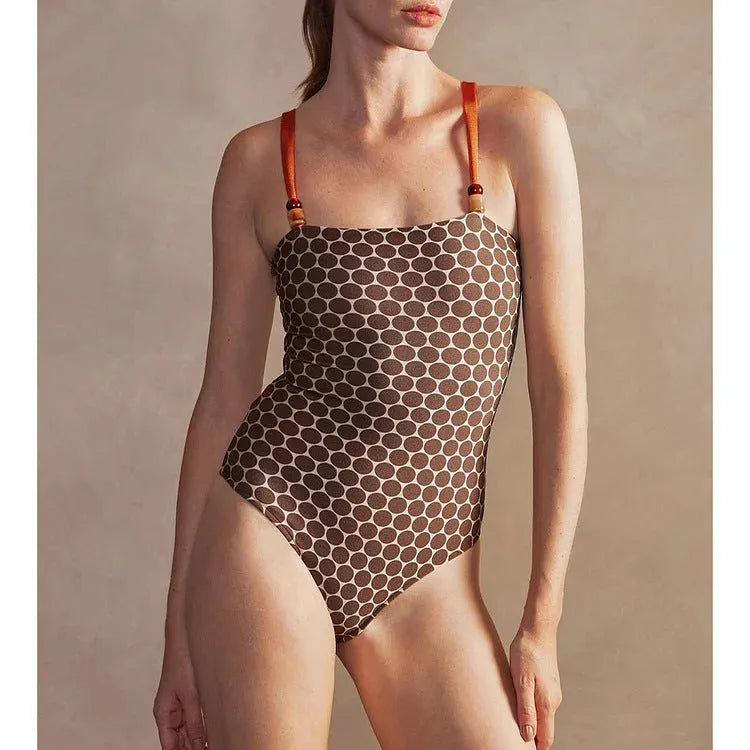 Women's printed dots one-piece swimsuit with matching wrap skirt in polyester fabric