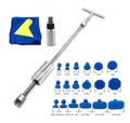 Automotive dent repair tool with T-shaped hammer and blue adhesive pads for car bodywork