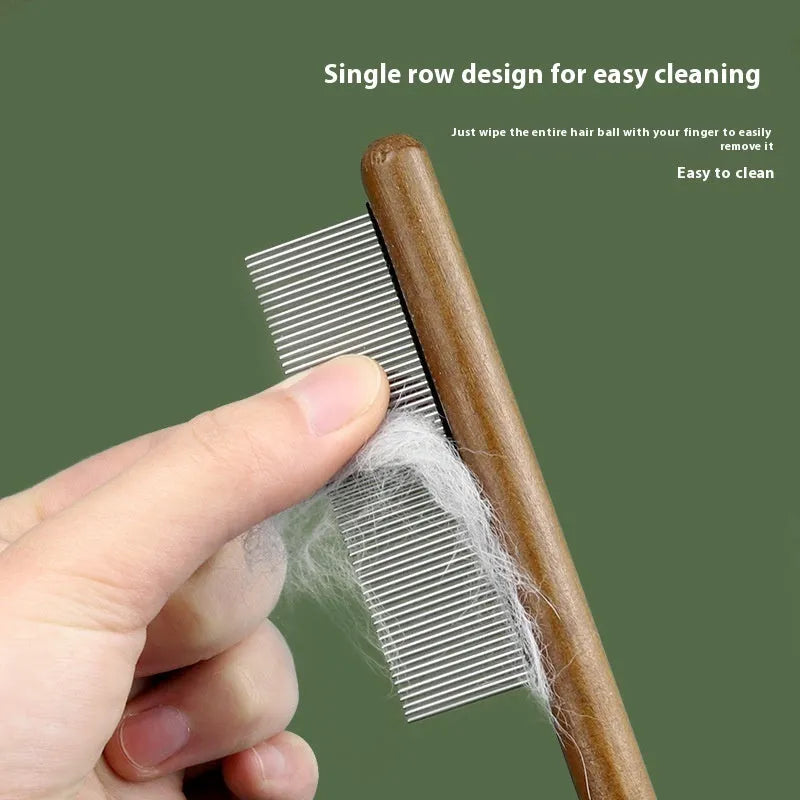 Stainless steel flea comb with dense teeth for removing fleas from a dog's coat