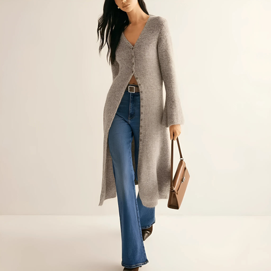 Khaki coloured long sleeve button-front cardigan with a French retro style on a hanger.