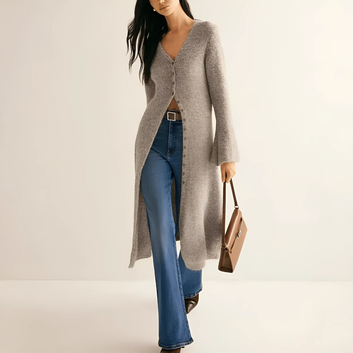 Khaki coloured long sleeve button-front cardigan with a French retro style on a hanger.
