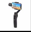 Black handheld three-axis phone stabiliser with wireless charging, 480g weight