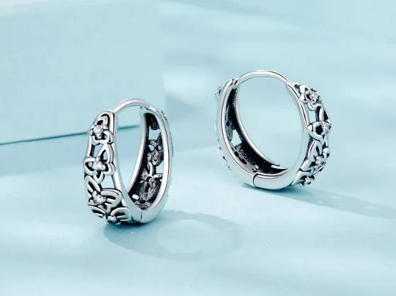 Retro hollow butterfly sterling silver earrings with zircon detail, showing 14mm height.
