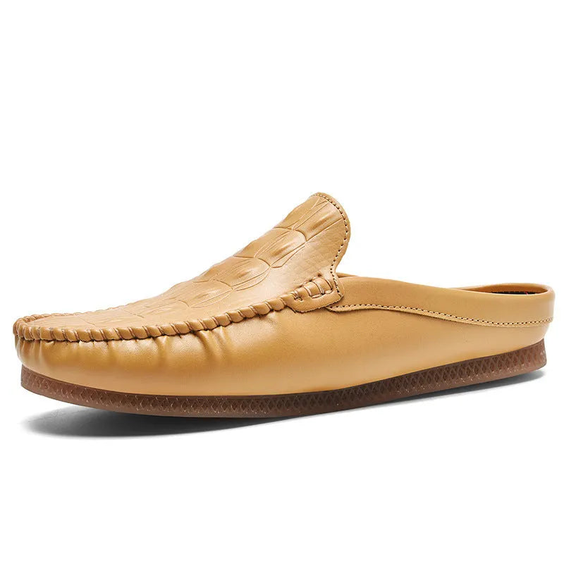 Men's black breathable Gommino semi-slippers with a rubber sole on a plain background