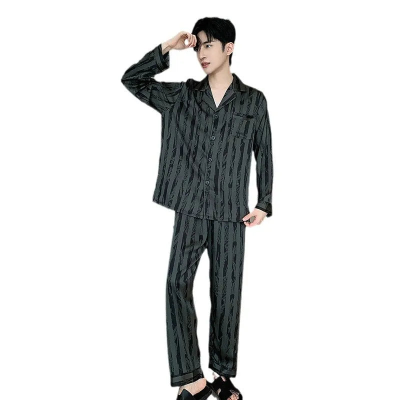 Men's black striped ice silk V-neck pyjama set with long sleeves and trousers.