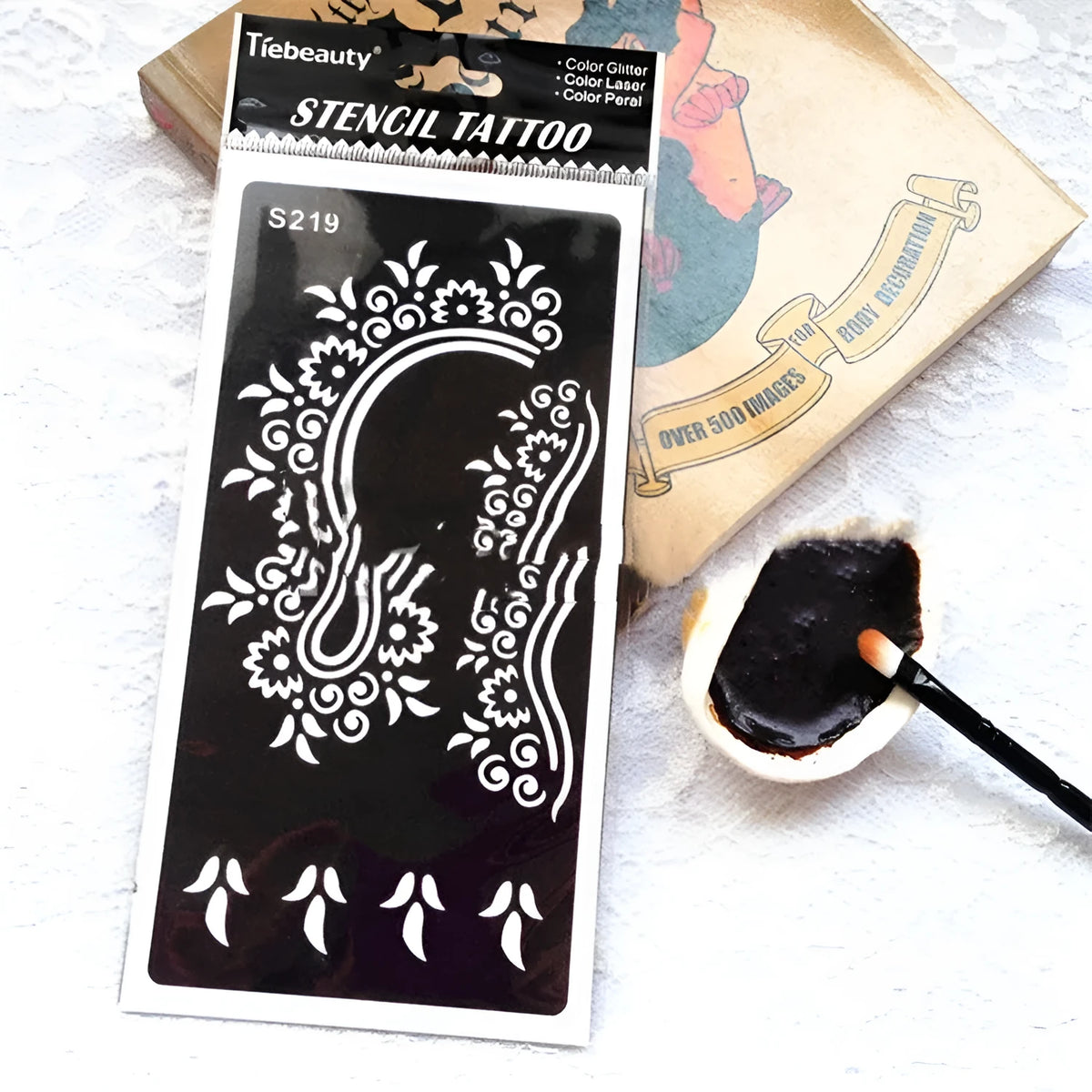 Semi-permanent hollow tattoo template sticker with geometric Southeast Asian design on water transfer paper.