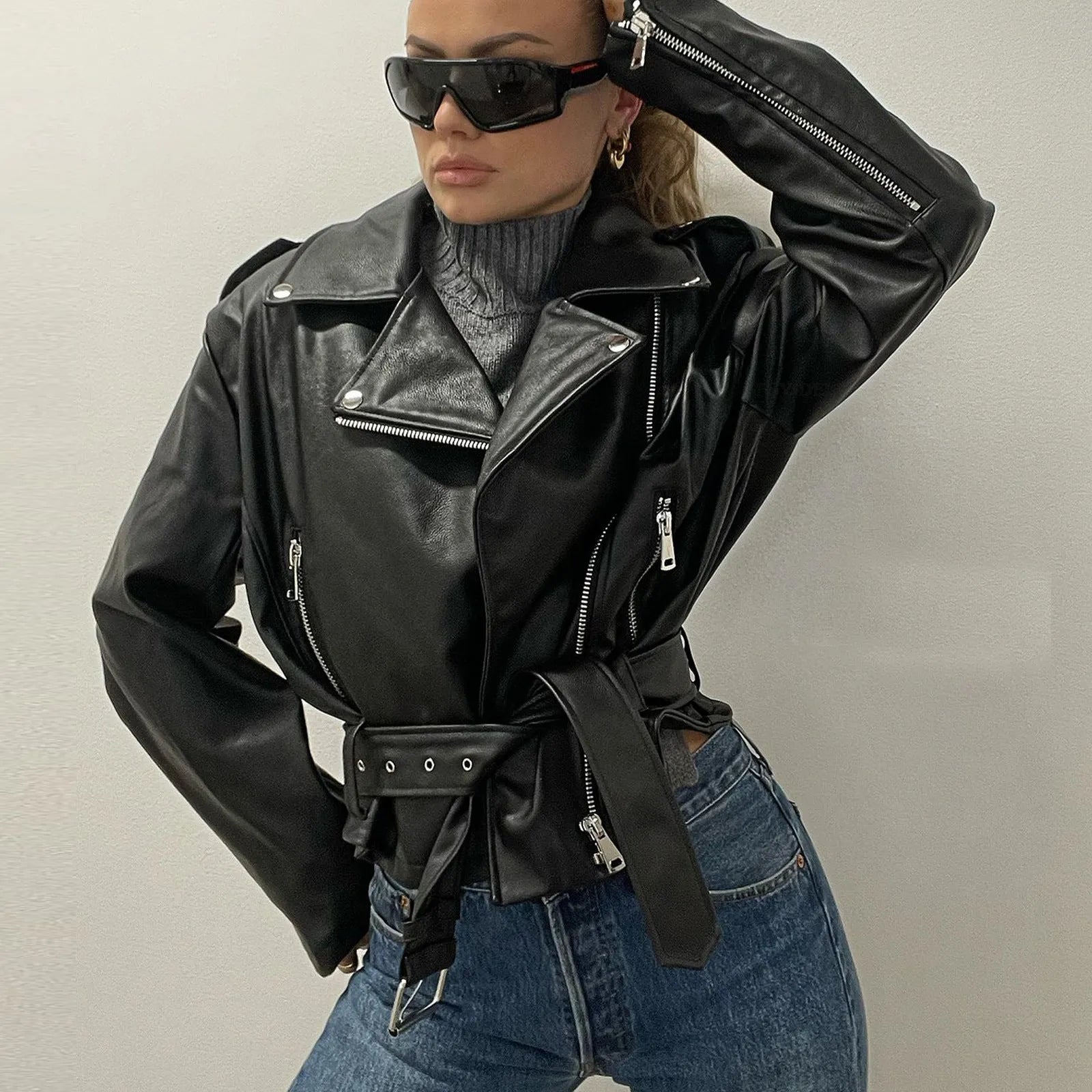 Punk style short leather-look jacket with locomotive lapels and Peter Pan collar in polyester fibre