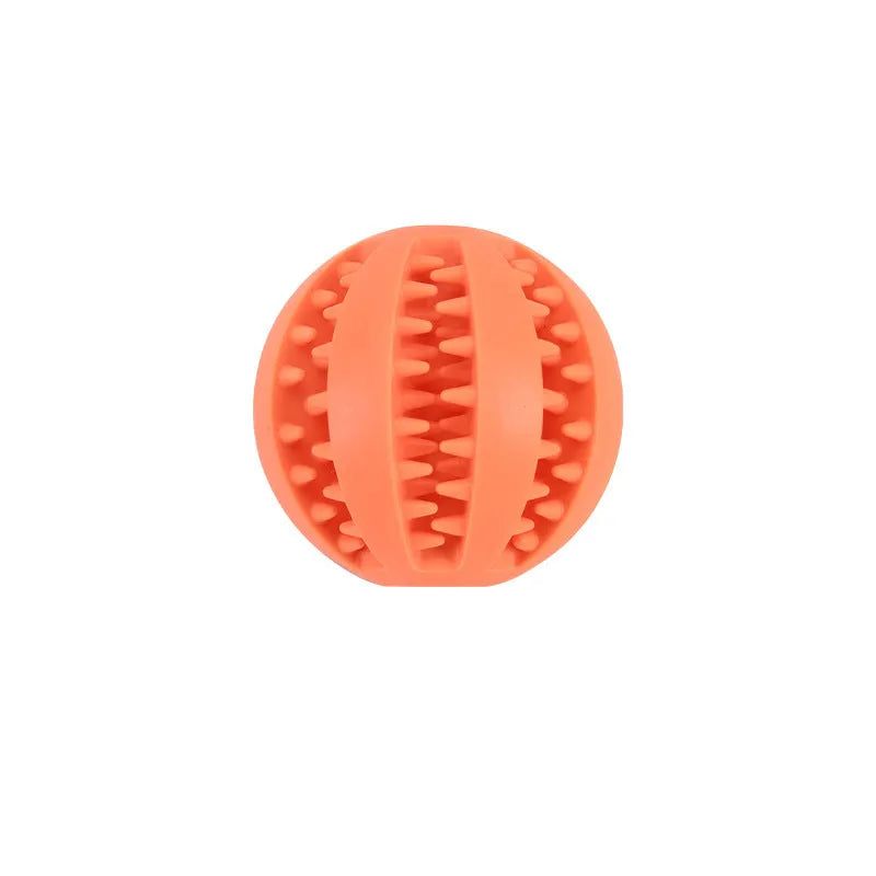 Small pink rubber pet dog toy self-hi relieving stuffy molars chew toy 5cm diameter on white background