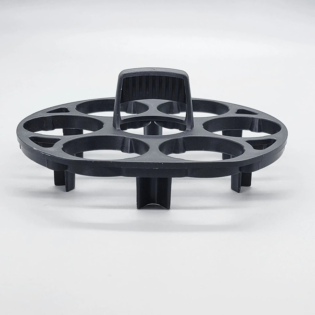 Black plastic egg holder basket for cooking machines measuring 13.8 x 12.6 x 5.7 cm