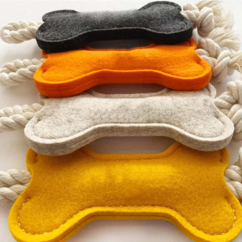 Bone shaped dog toy with rope knot construction in four colour options for bite resistant training