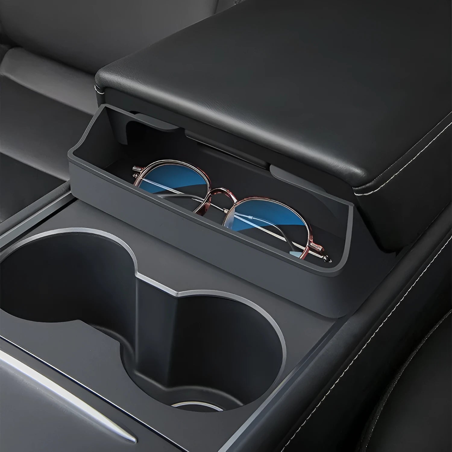 Black silicone Tesla Model 3 and Model Y central armrest glasses case for interior organisation