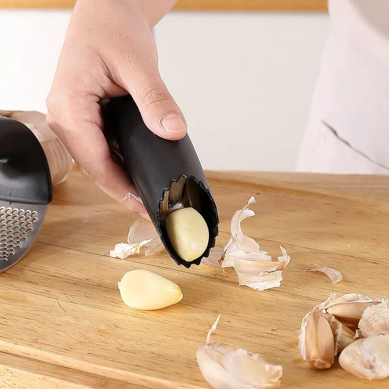 304 stainless steel garlic press in four colour options showing modern design and compact 11 by 7cm dimensions