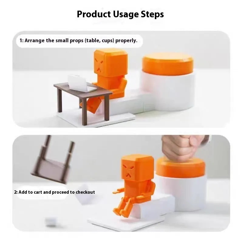 Orange plastic decompression toy with a table-turning mechanism on a desk.