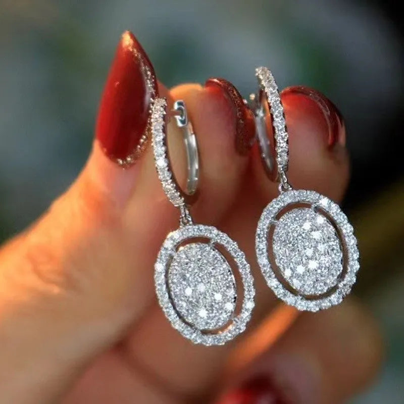 White gold plated oval earrings for women with copper base and geometric European American style, one pair