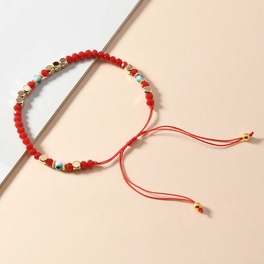 Red hand-woven artificial crystal beaded couple bracelet with geometric eye design in ins style