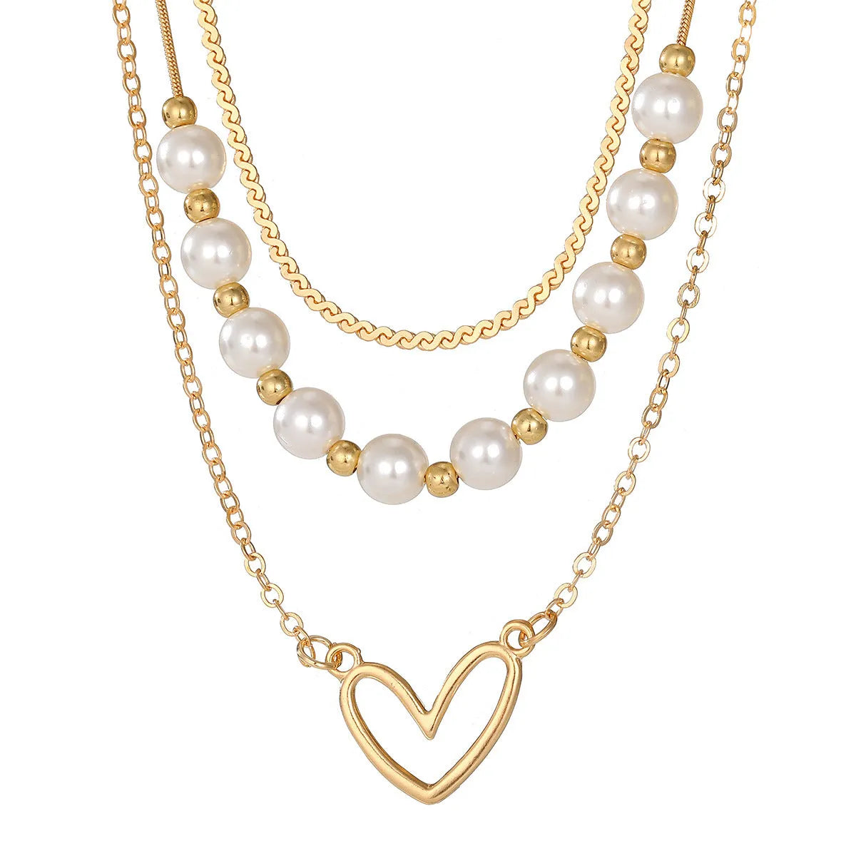 Vintage gold necklace with heart-shaped pendant on adjustable pearl-style chain