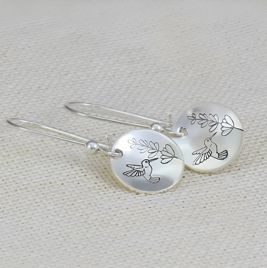 Silver retro bird flower glossy round women's earrings made from zinc alloy