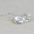 Silver retro bird flower glossy round women's earrings made from zinc alloy