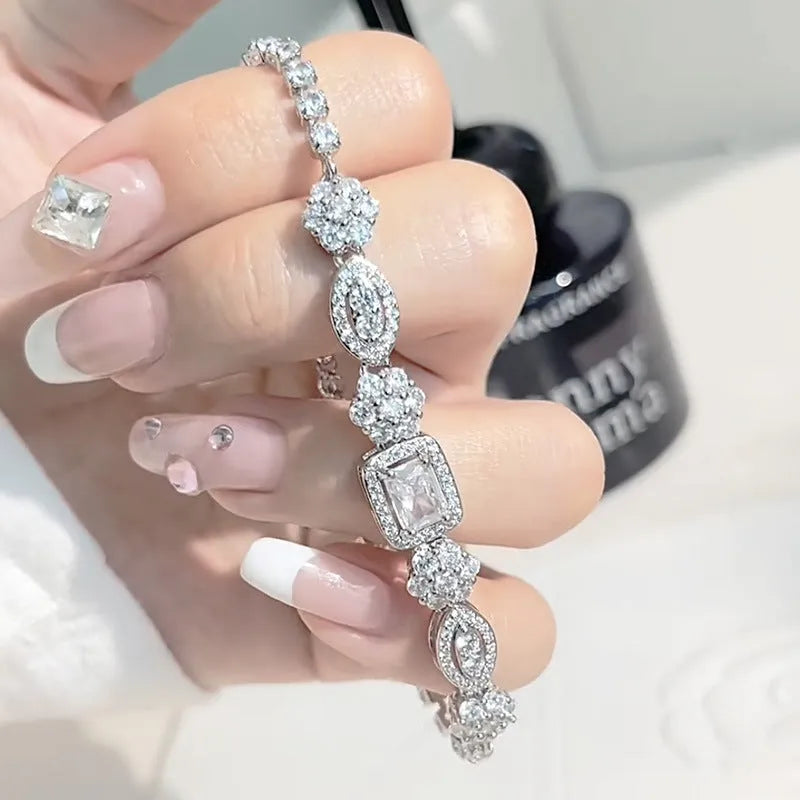 Women's geometric S925 silver-plated bracelet with inlaid zircon stones, shown in two size options.