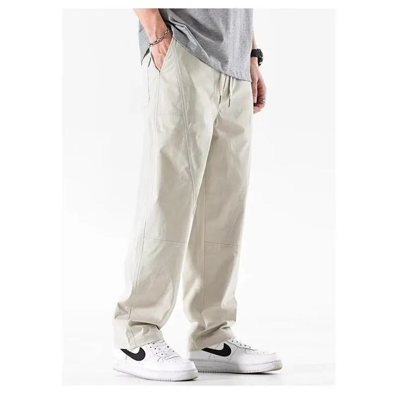 Casual wide-leg cotton trousers in milky white colour showing pants-mouth style