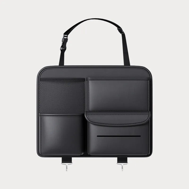 Black leather car seat back storage hanging bag with carrying handle shown attached to vehicle seat