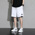 Cotton shorts for boys in plus sizes, showing mid waist and short length design in khaki colour.