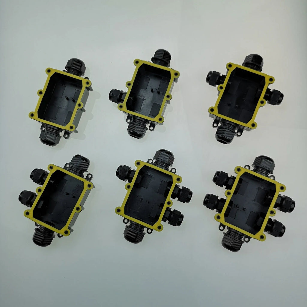 IP68 waterproof six-way outdoor junction box in black, white, or transparent, with connector, for fountain light cables.