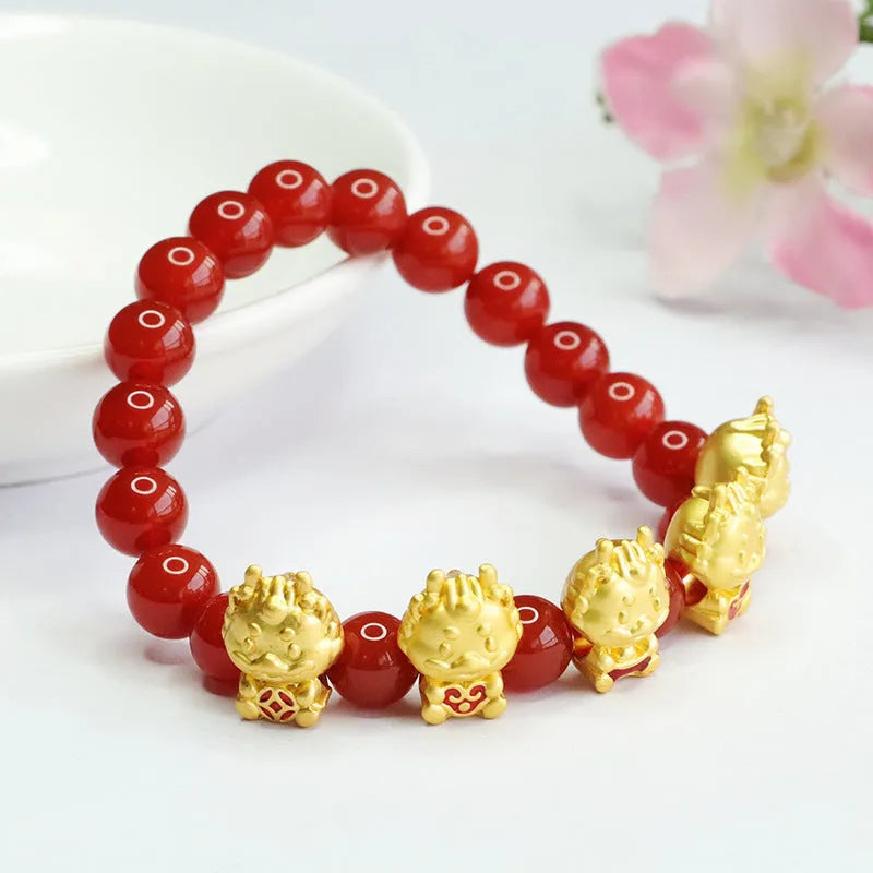 Red agate Five Blessing Dragon bracelet with 8mm beads on a wrist.