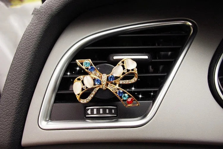 Alloy car air vent fragrance clip in a decorative style, measuring 6.3 by 4.5 centimetres.