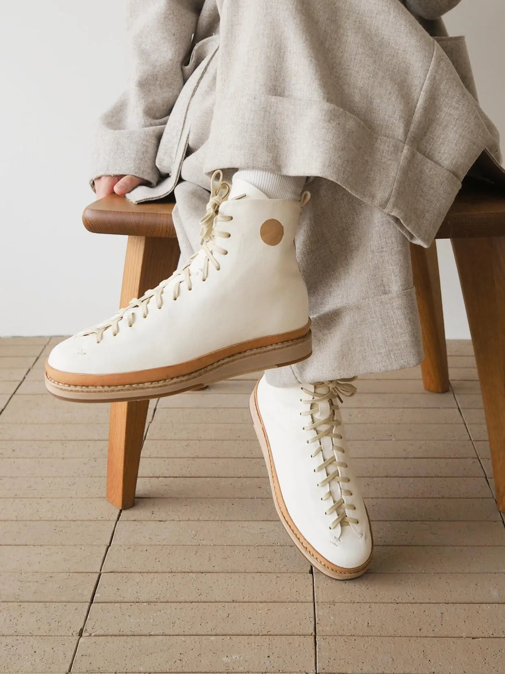 High-top microfibre board shoes with platform sole and lace-up closure, white colourway