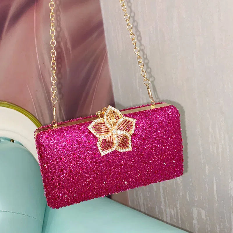 Rose red PVC crossbody bag with diamond inlay, single shoulder strap, and pillow shape for daily wear