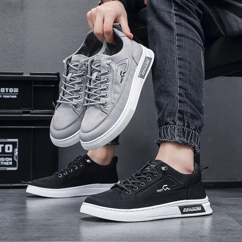 Grey men's casual canvas shoes with round toe and lace-up design featuring breathable construction