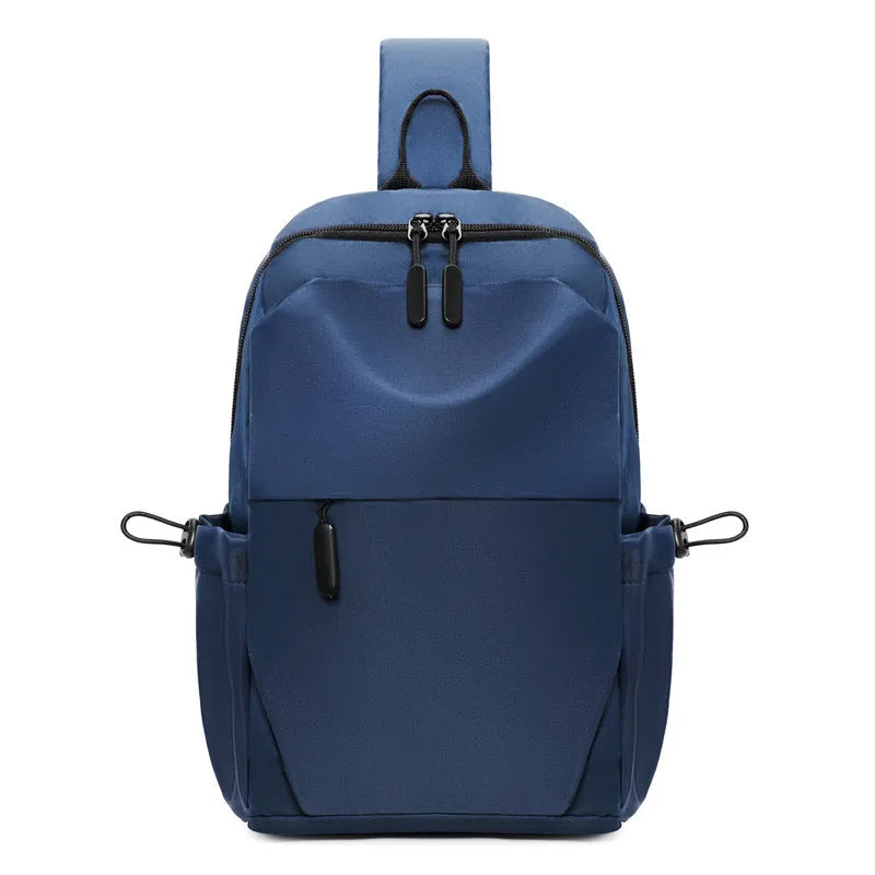 Grey mens chest bag showing shoulder strap and main compartment with waterproof exterior.