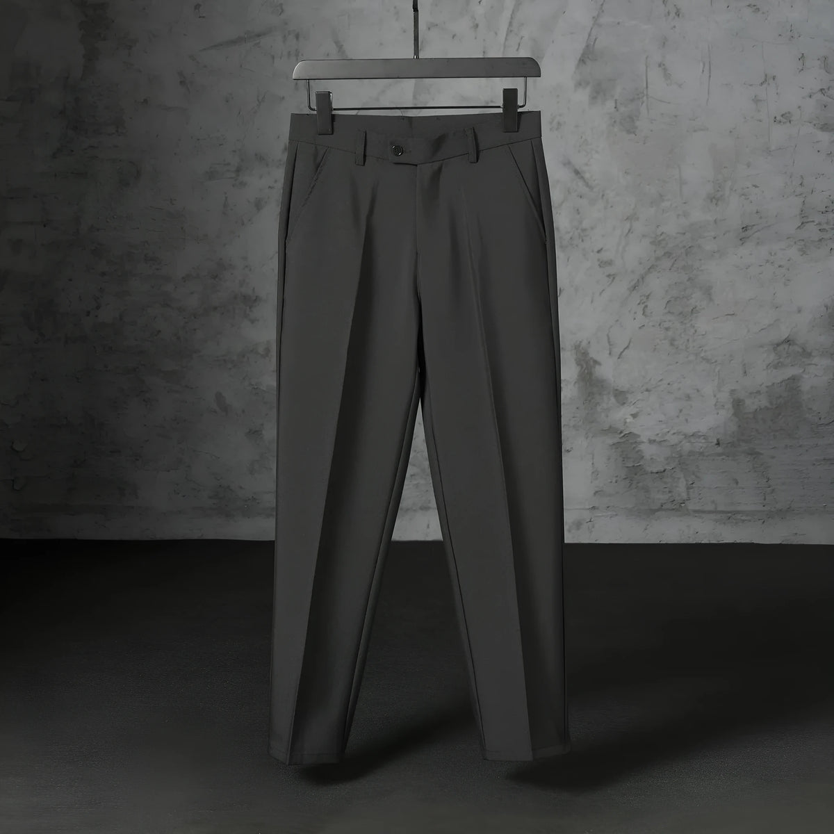 Men's straight loose trousers in light gray brushed polyester, front view showing straight cut and elastic waist
