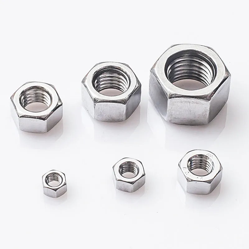 304 stainless steel thickened hexagon nut set with sizes from M5 to M56 on a workbench