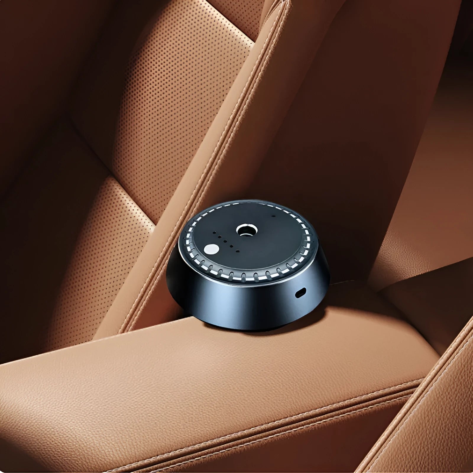 Black metal car aroma diffuser measuring 9x4.5cm with ultrasonic atomizer technology